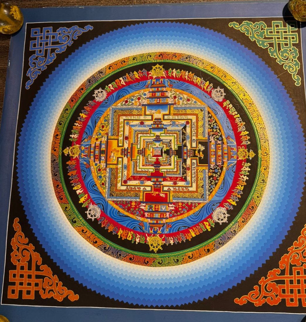Kalachakra Mandala Thangka (Blue) — Hand-painted mandala thangka on cotton canvas, fine detail work throughout.